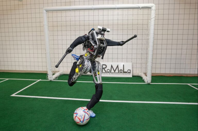 ARTEMIS+humanoid+robot+kicking+a+soccer+ball+RoMeLa+at+UCLA_hero